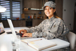 female soldier at her desk