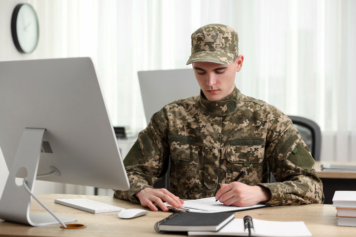 young soldier at his desk